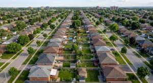 Aerial view of East Hamilton residential neighbourhood showing detached homes on deeper lots with accessible rear yards — typical of Crown Point and Gibson pre-1980s housing stock 
