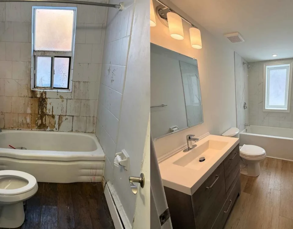 Hamilton bathroom mid-renovation showing subfloor removal and exposed cast iron drain stack — Gateway Group project 2025