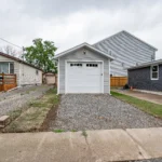 Homeowner reviewing a home renovation budget for a house in Hamilton, Ontario