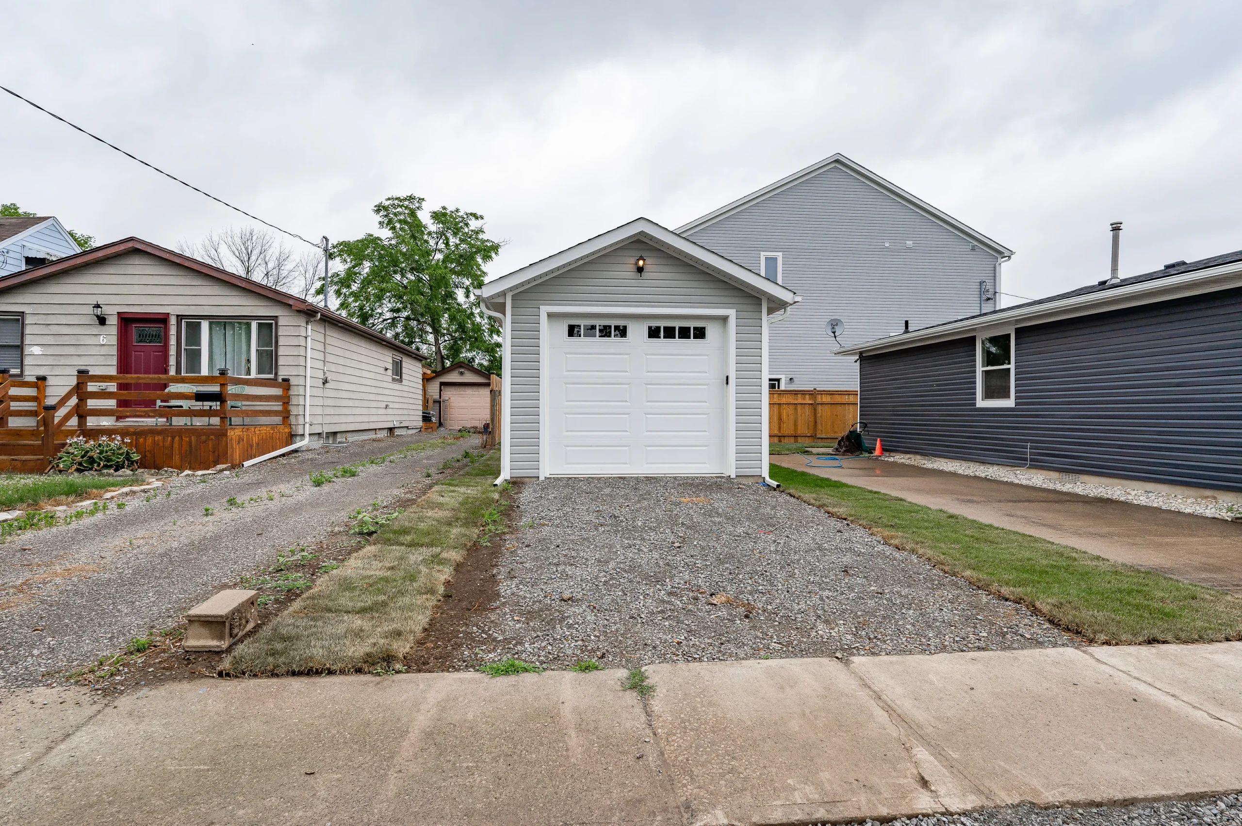 Homeowner reviewing a home renovation budget for a house in Hamilton, Ontario
