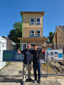 Gateway Group project manager reviewing work on a secondary suite conversion jobsite in Hamilton
